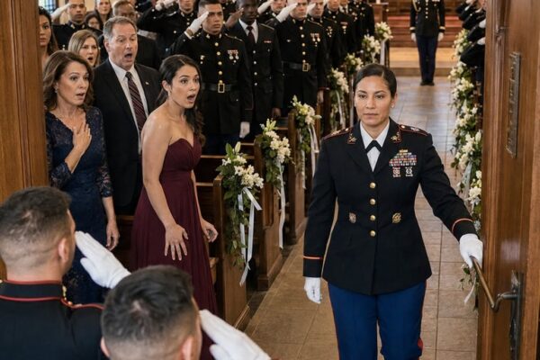 My sister laughed the moment she saw me standing in my military dress blues on the morning of my wedding. She called me humiliating, manly, and pitiful because I refused to wear the white designer gown my mother had bought to “repair” me. But twenty minutes later, when the chapel doors swung open, five hundred Marines stood at once in flawless unison, and the booming command “GENERAL ON DECK!” destroyed every arrogant smile my family had been wearing.